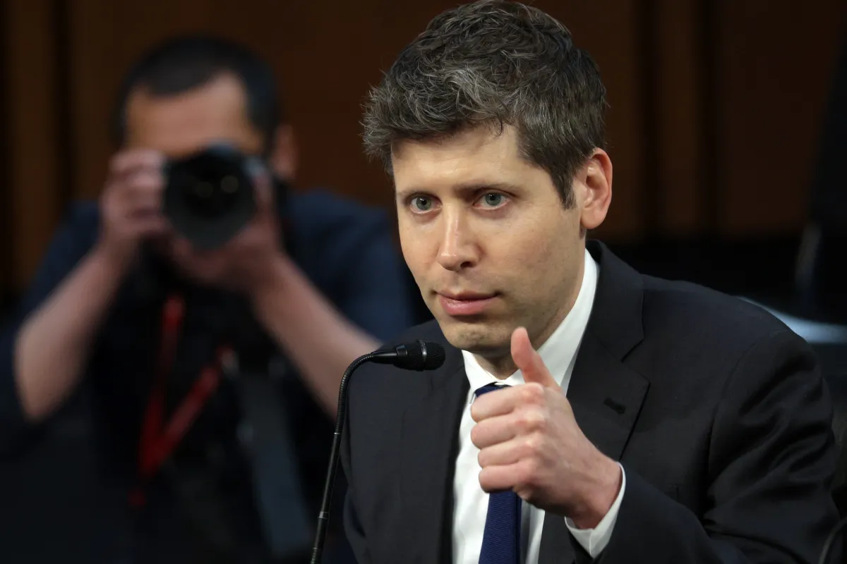 Developers' reactions to Sam Altman's attitude towards manual coding